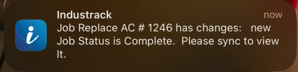 A push notification telling a field employee the office completed their job